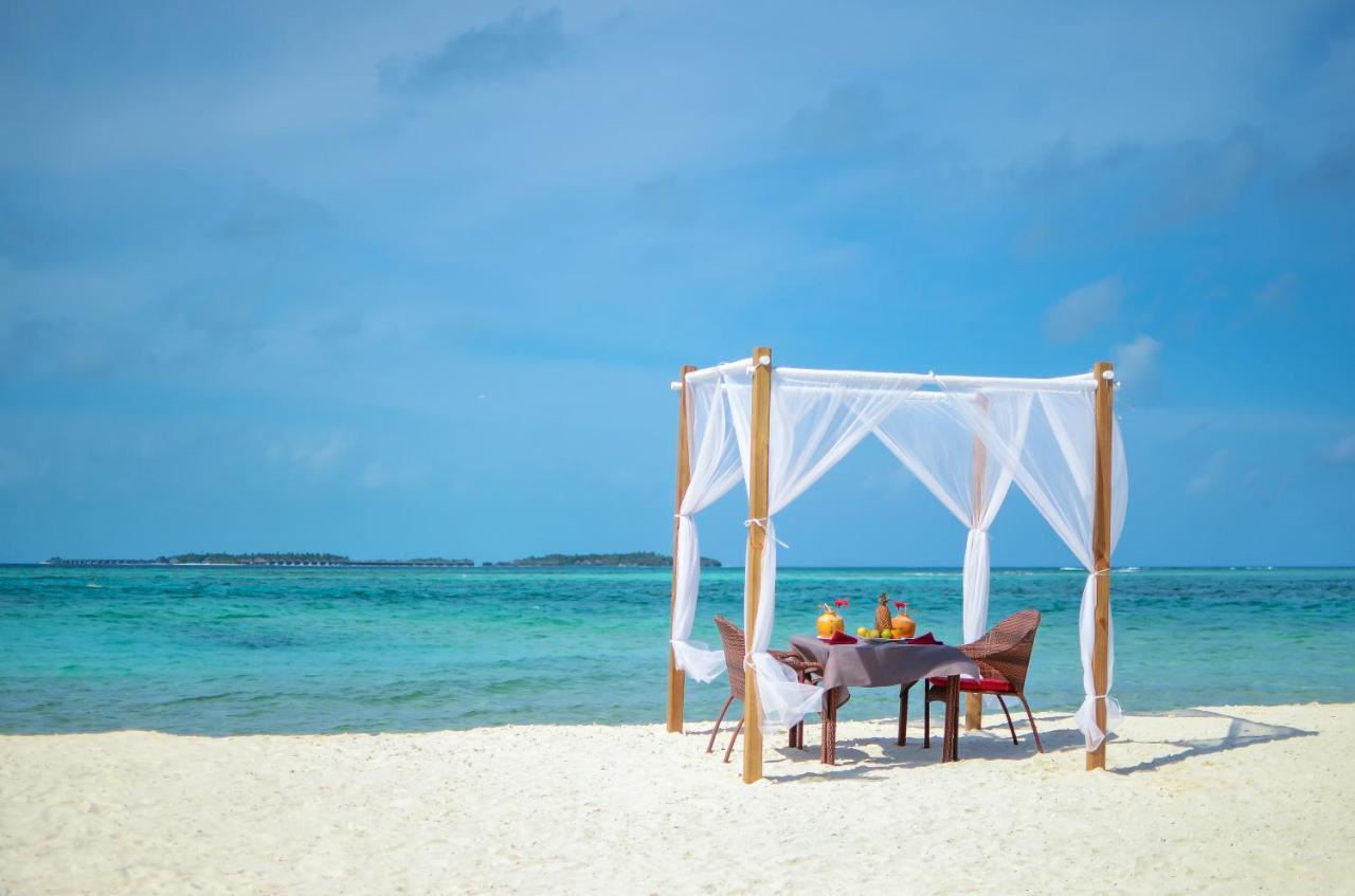 Triton Beach Hotel & Spa Maafushi Bagian luar foto